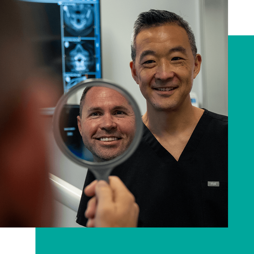 dr chin showing man new smile