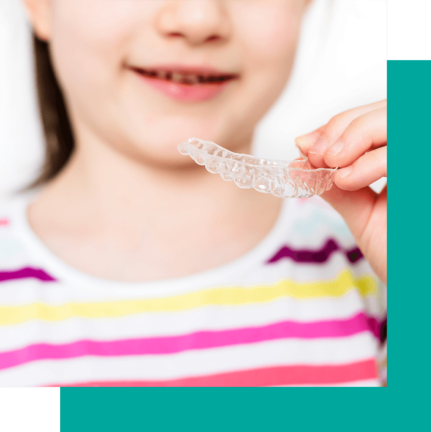 girl with ortho aligner
