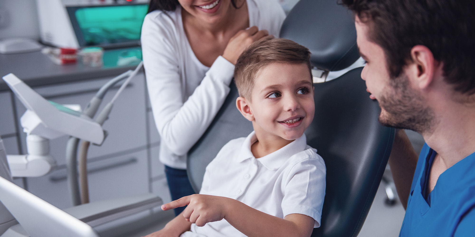 little kid listening to dentist