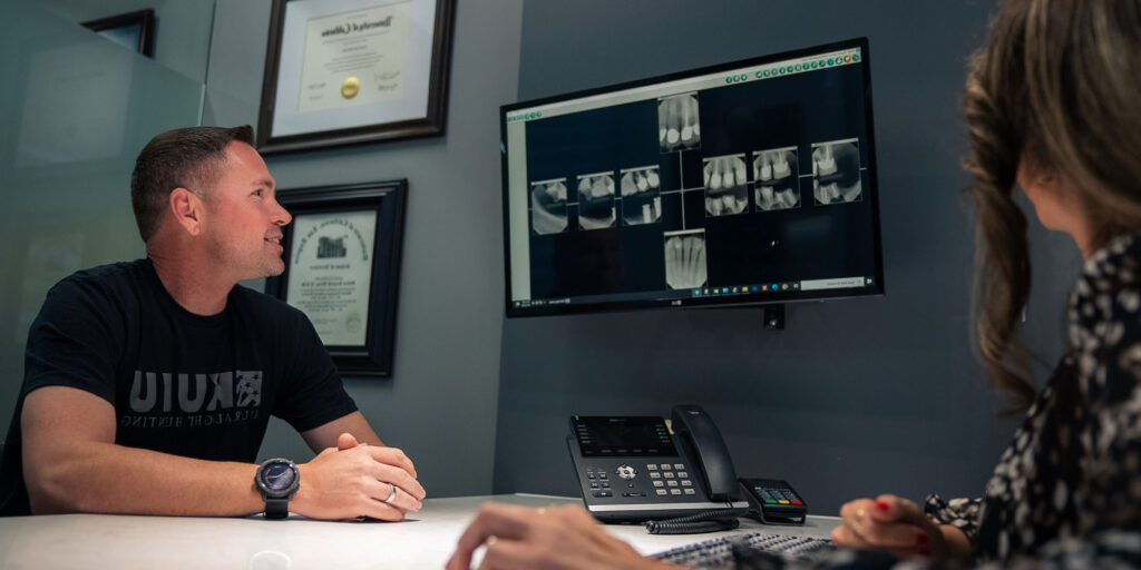 man going over treatment plan